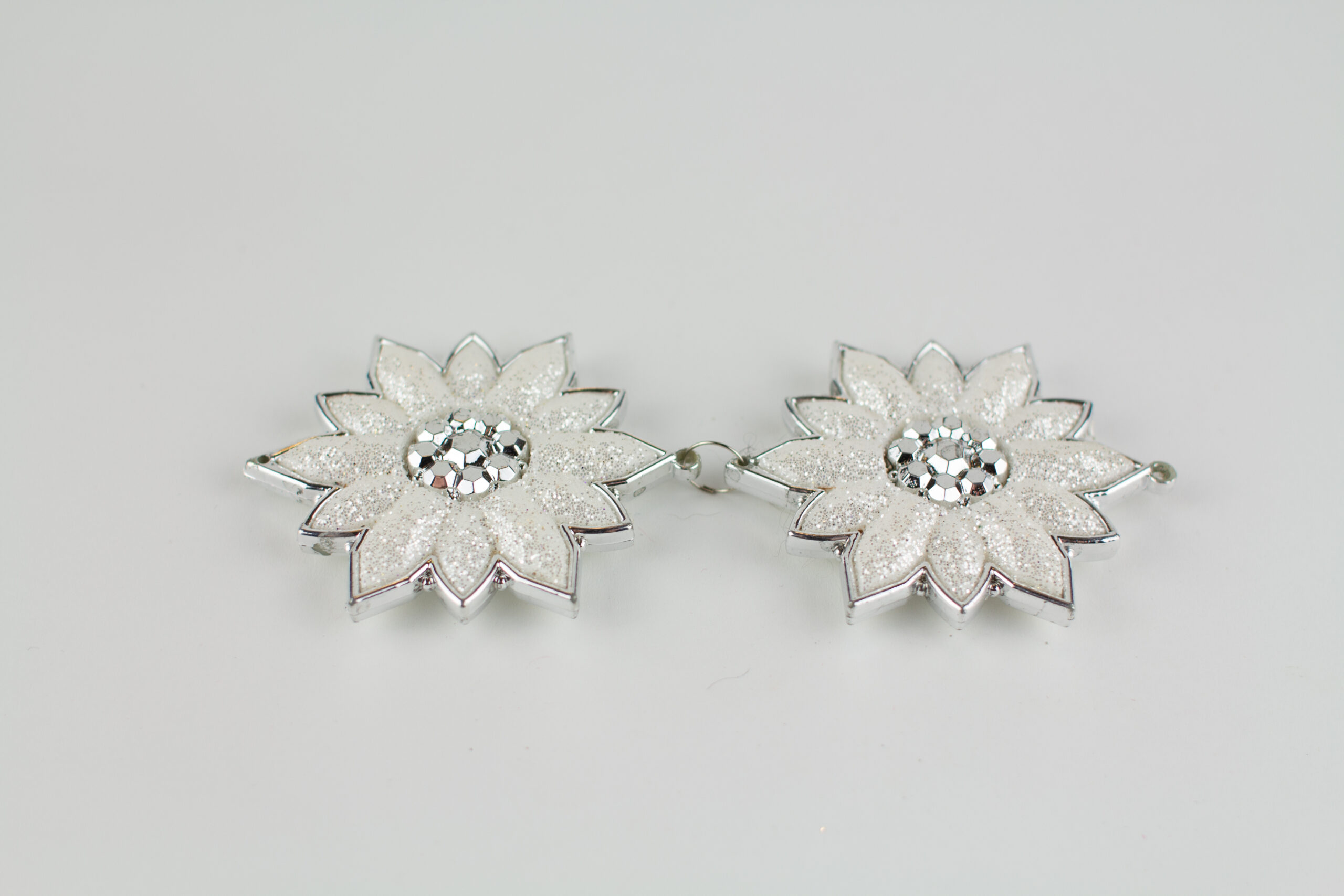 christmas tree toy silver flowers on white background